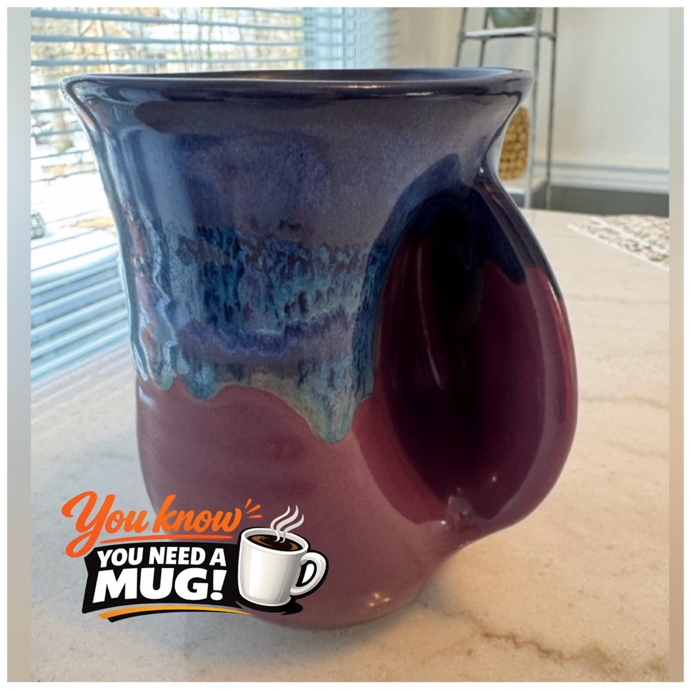 Neher Clay in Motion, hand warmer mug for right handed use.  Signed and dated
